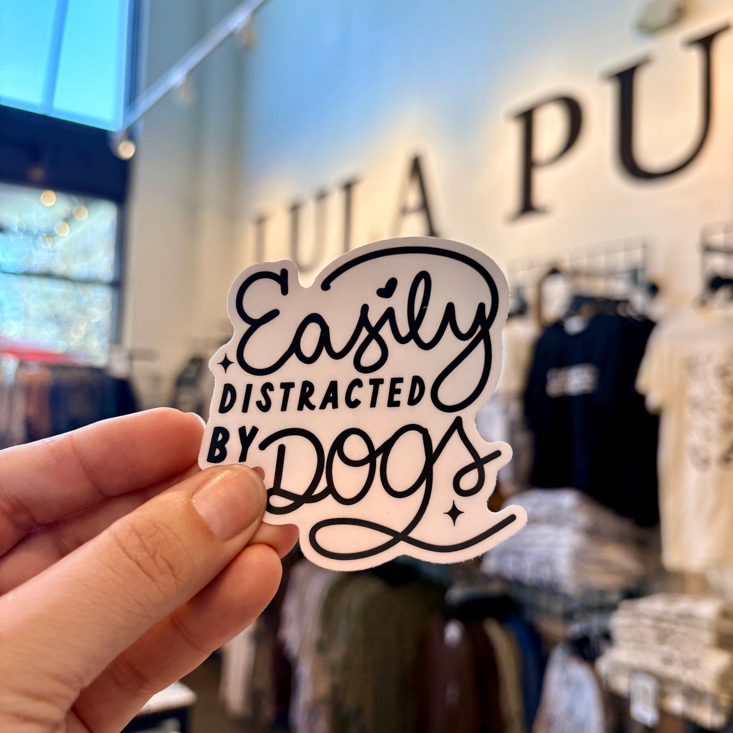 Easily distracted by dogs sticker